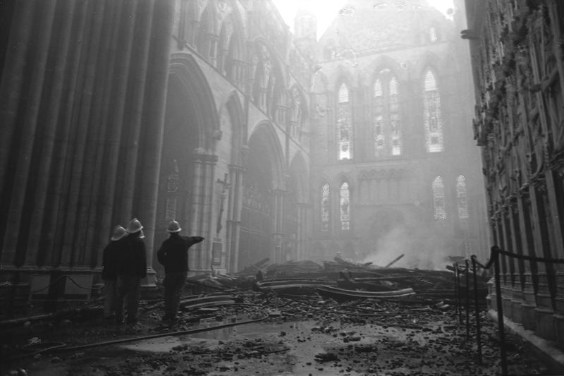Inspecting fire damage at a historic cathedral